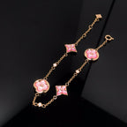 TimiSTAR AND SUN 4 MOTIF PINK MOP PINK GOLD BRACELET