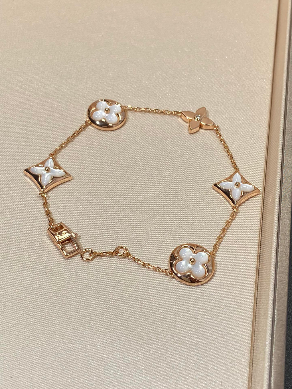 TimiSTAR AND SUN 5 MOTIF MOP PINK GOLD BRACELET