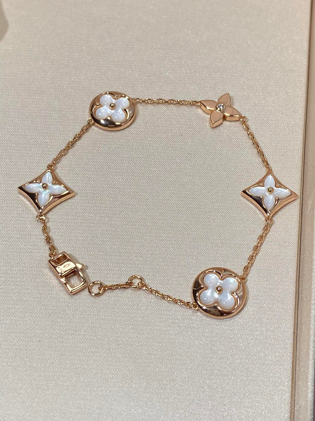TimiSTAR AND SUN 5 MOTIF MOP PINK GOLD BRACELET