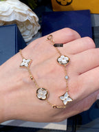 TimiSTAR AND SUN 4 MOTIF WHITE MOP PINK GOLD BRACELET