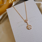 TimiSTAR AND SUN WHITE MOP 2 MOTIF PINK GOLD NECKLACE