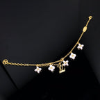 TimiLOGO 6 MOTIF STAR AND SUN GOLD BRACELET